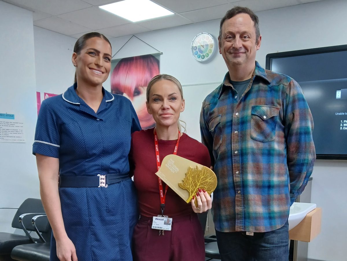 Lisa Charles pictured with her award beside Matt Allwright from The One show and Janine Shearing from The Royal Marsden.