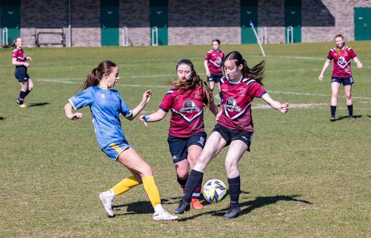 Student coaches see results of learning as Winchester women’s football team top league