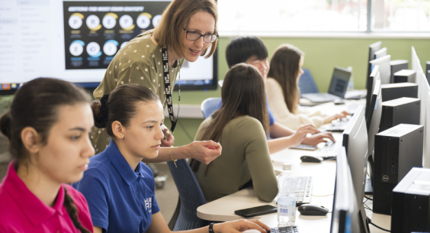 Students working on computers in a college.
