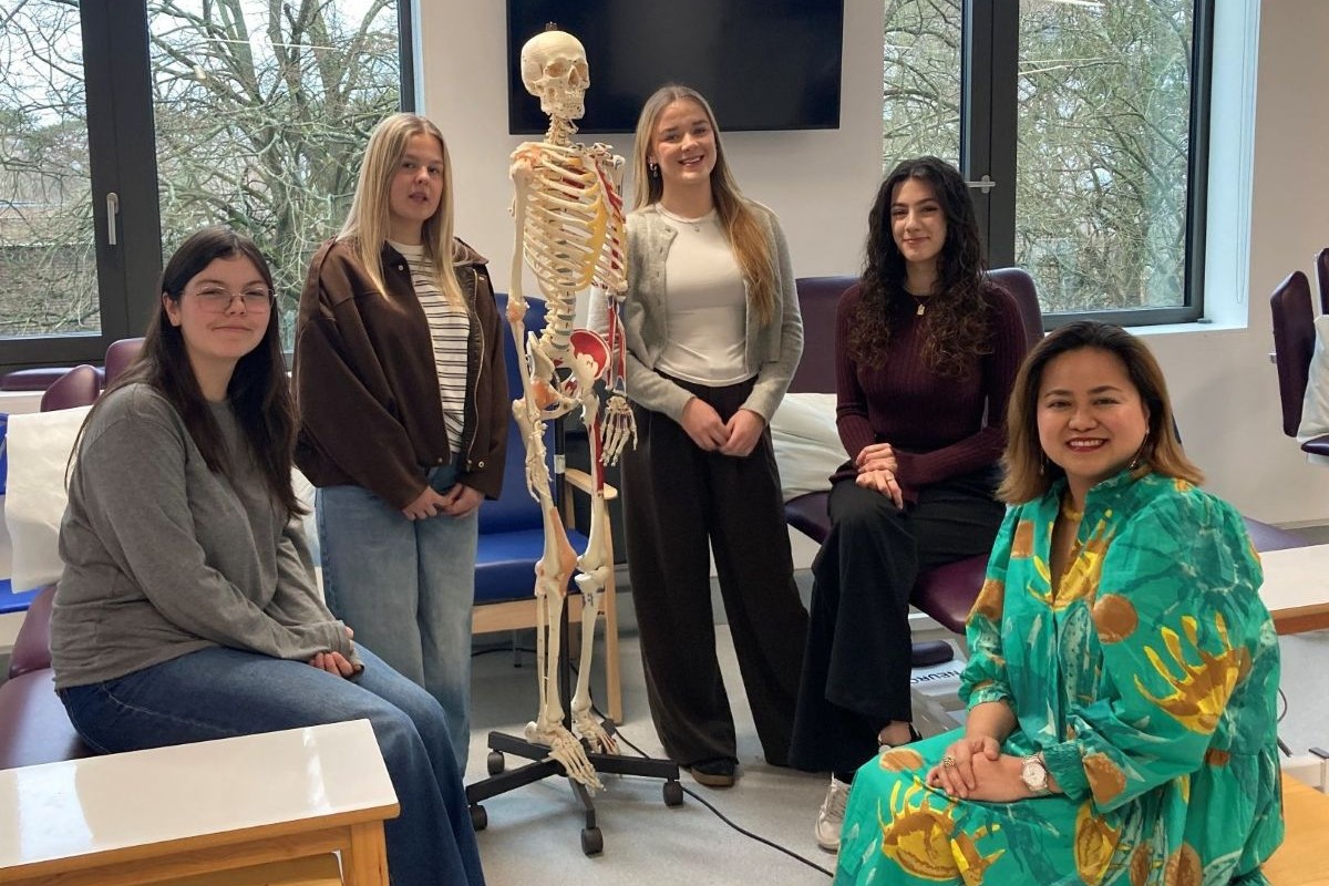 Pictured: Student leaders of the Global Minds in Motion physiotherapy network in the University's physiotherapy practical suite (from left): Antonia Szewczyk, Millie Freeman, Julia Sweet, and Christina Anagnostopoulou with Project leader and Senior Lecturer in Physiotherapy, Josephine Morris.