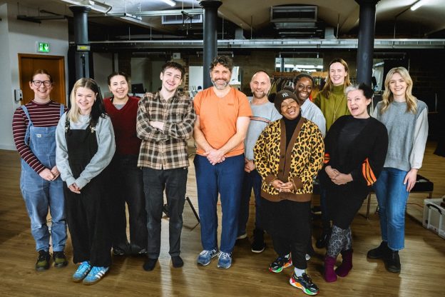 Leeds City College and University Centre Leeds students standing in a group and smiling