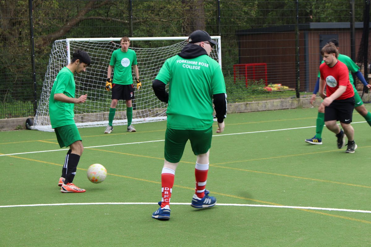 Learners from Yorkshire Rose College and Homefield College enjoy a competitive game of football