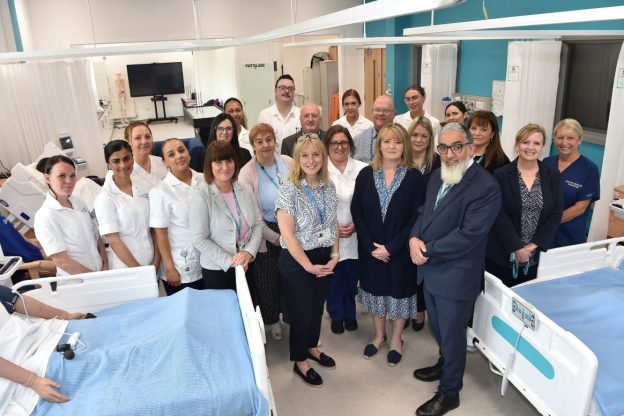Blackburn College Principal Dr Fazal Dad with representives and students at the Blackburn College Immersive health ward