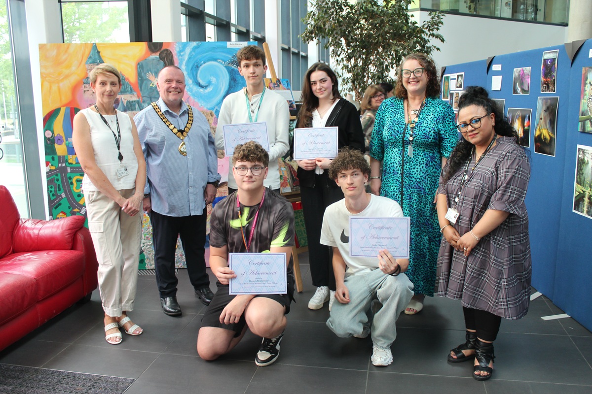 Group photo: left to right, first row: Photography students Owen Birchmore and Jake Sapsed. Second row, left to right: Sue Dew-Gosling, Creative Arts Lecturer at Activate Learning, The Worshipful the Mayor of the Borough of Bracknell Forest Councillor Peter Frewer, Art and Design students Presley and Natalie, Stephanie Cronin, Learning for Leisure Tutor and Bina Howard, Bina Howard, Curriculum Manager – Createch at Activate Learning.