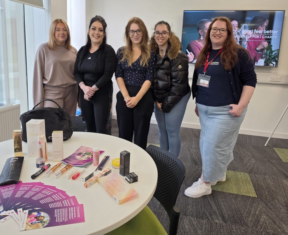 Photo of five people standing in a classroom setting at the Scottish Borders Campus