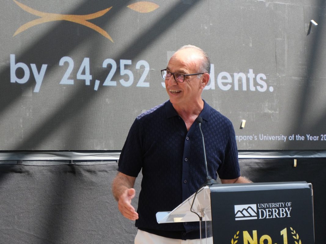 businessman theo paphitis addresses the audience at the university of derby