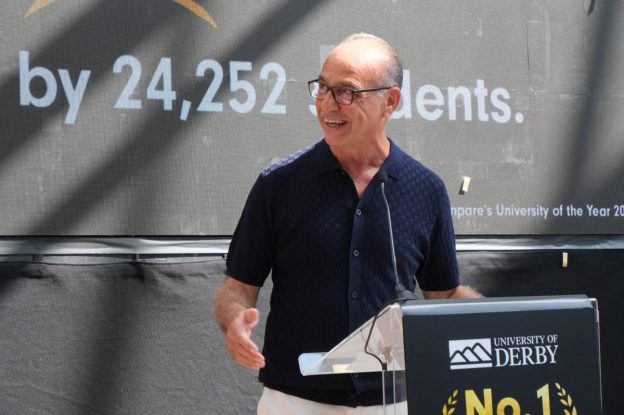 businessman theo paphitis addresses the audience at the university of derby