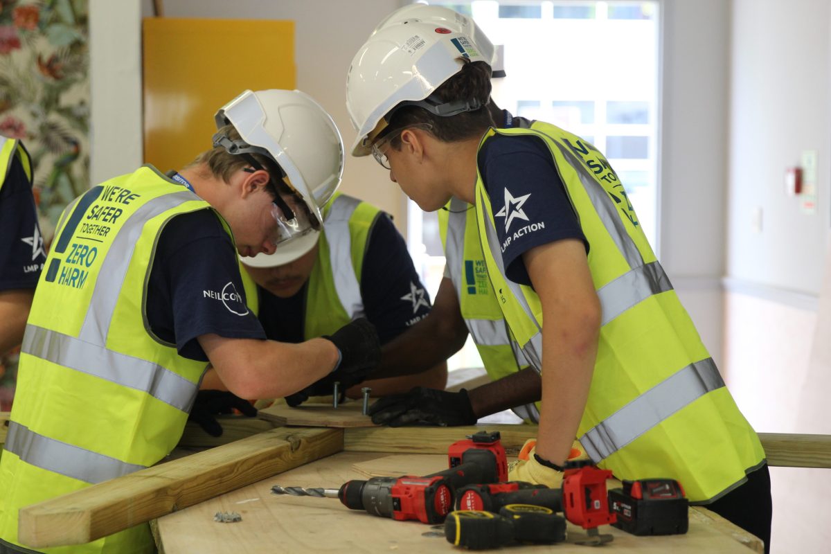 Students learning woodworking skills at Nescot college