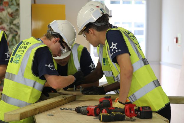 Students learning woodworking skills at Nescot college