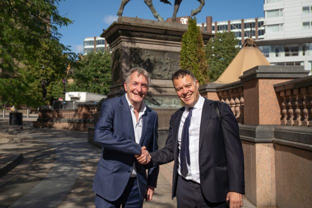 Shaking hands - Peter Slee and Bill Jones