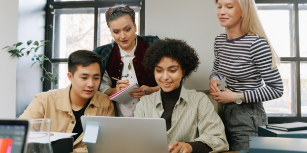 A group of GCSE and A-Level learners get their results online