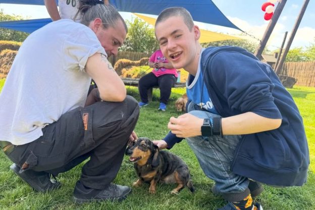From Fear to Purpose: Enfield Student Who Once Crossed the Road to Avoid Dogs Now Calls a Dog Hotel His “Workplace”