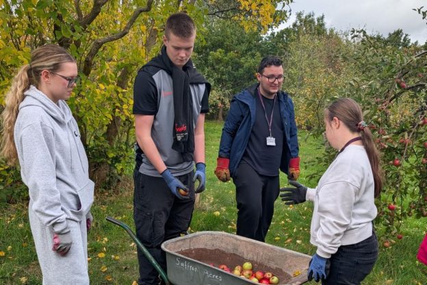 Students volunteering at the Saffron Acres community food growing project