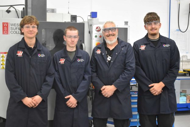 EEG students in the Gene Haas Foundation Centre in Bury St Edmunds with their tutor Derek - reflecting on the importance of NMD