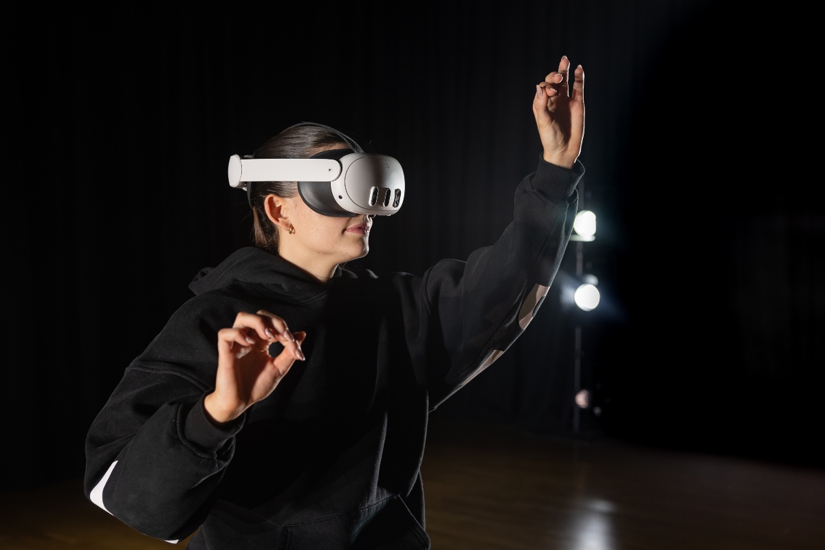 A Dance student wearing a VR headset.