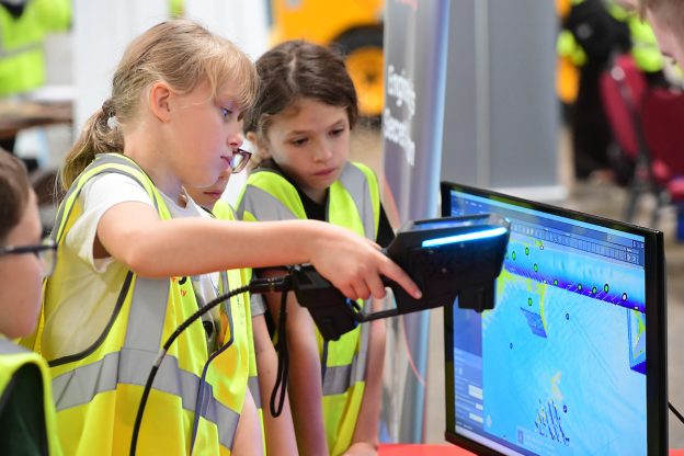 Pupils trying Altrad's laser scanning activity at Construction & Engineering Week 2026