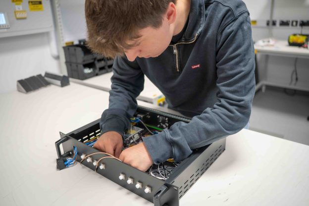 Ollie Lee working at his engineering placement with Oriole in Paignton after studying T Level Design and Development for Engineering and Manufacturing at South Devon College