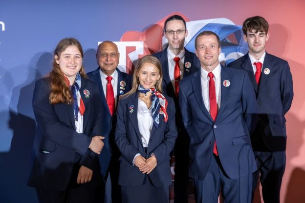 The Grŵp Llandrillo Menai team standing together in their WorldSkills uniforms.
