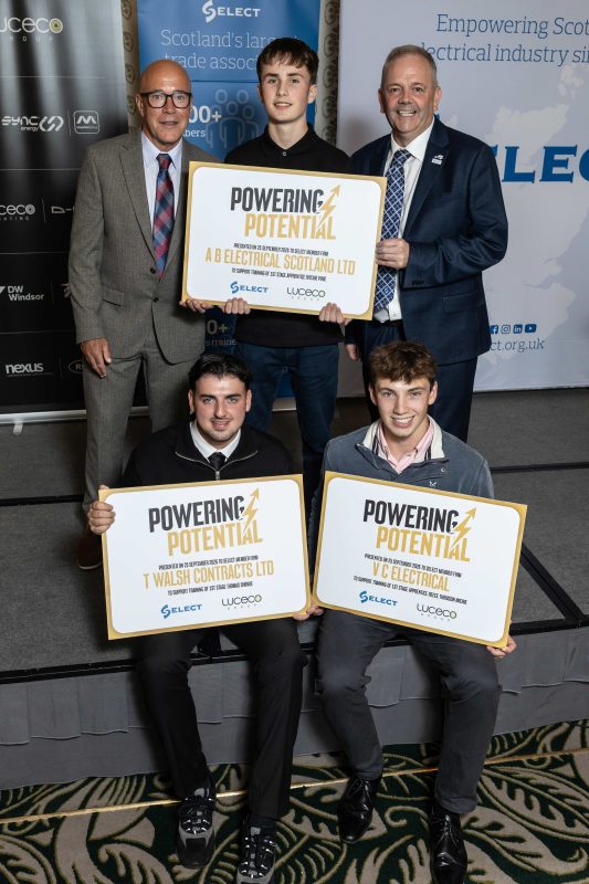 Ian Hunter, left, and Darren Crockett, right, with the three apprentices 2