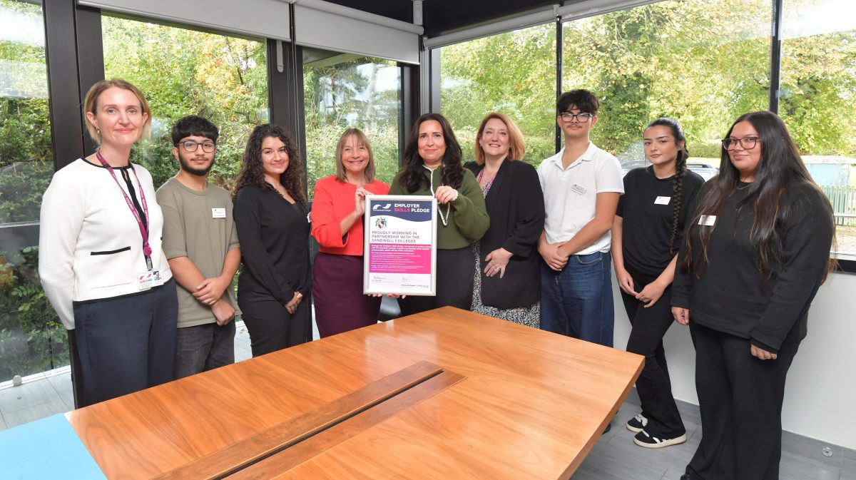 College principal Lisa Capper MBE, staff and students show skills pledge with care village HR business partner