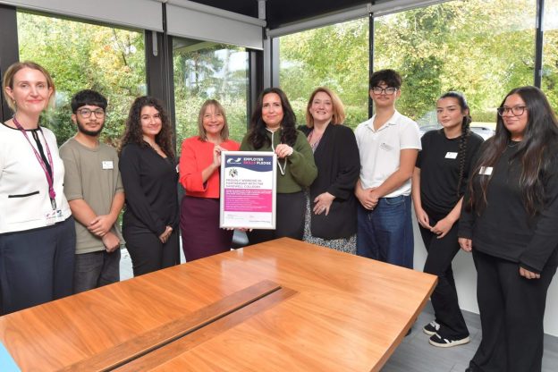 College principal Lisa Capper MBE, staff and students show skills pledge with care village HR business partner